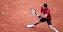 10SBALLS SHARES PHOTO GALLERY OF NOVAK DJOKOVIC STRETCHING & SLIDING FOR THE BALL AT THE FRENCH OPEN TENNIS IN PARIS thumbnail