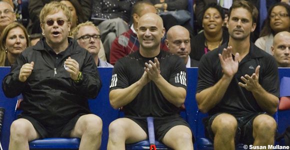 Sir Elton John, Andre Agassi and Jan Michael Gambill cheer on their team.