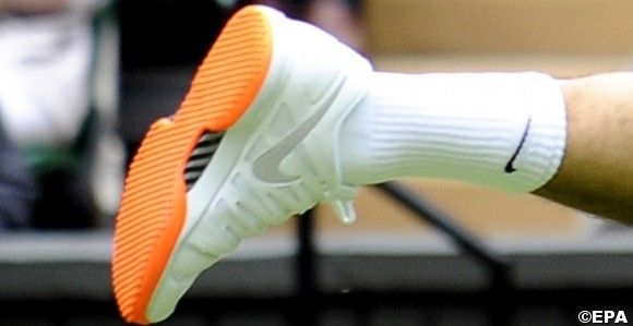 Federer to switch shoes with orange sole